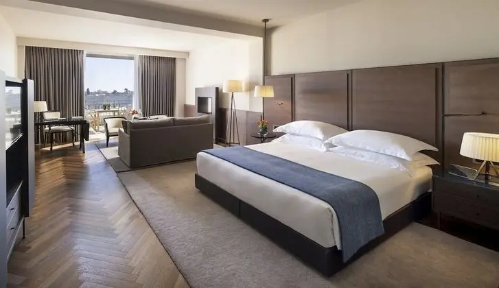 Junior Suite with Balcony and Old City View.