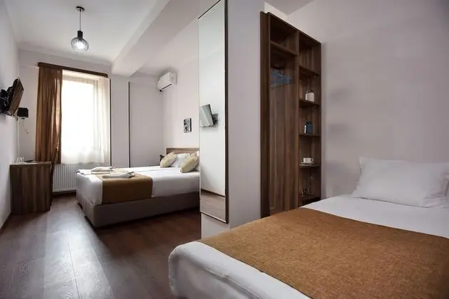 Deluxe Üç Kişilik Oda