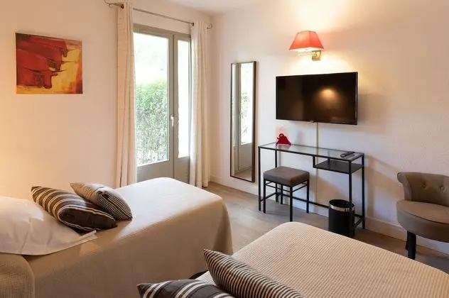 Chambre climatisée lits jumeaux