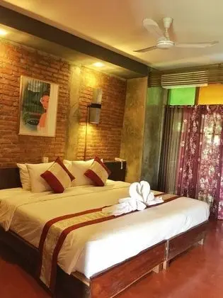 Deluxe Tek Büyük veya İki Ayrı Yataklı Oda