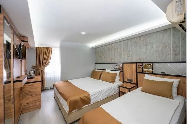 Deluxe Üç Kişilik Oda