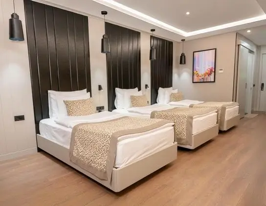 Deluxe Üç Kişilik Oda