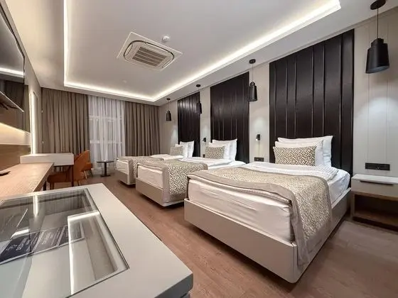 Deluxe Üç Kişilik Oda