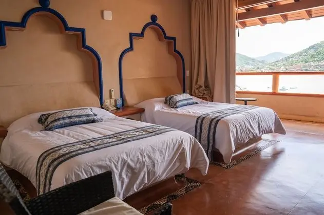 Deluxe Tek Büyük Yataklı Oda, 2 Çift Kişilik Yatak, Balkon, Deniz Manzaralı