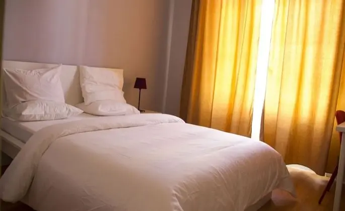 Double Bed with Balcony and Shared Bathroom