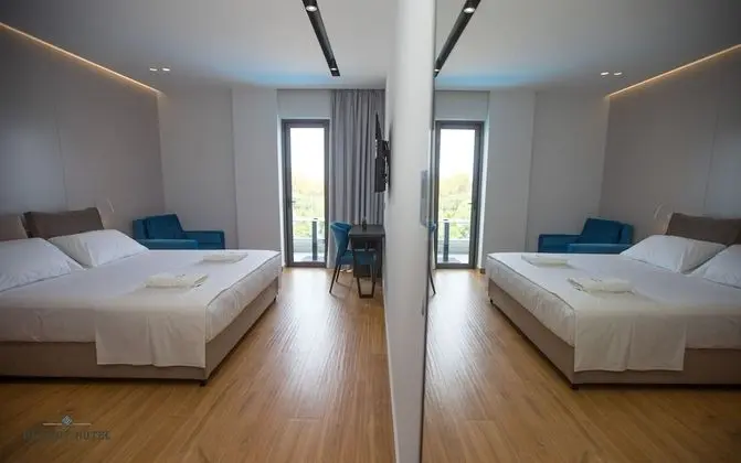 Deluxe Tek Büyük veya İki Ayrı Yataklı Oda