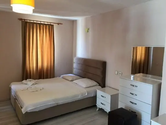 Üç Kişilik Oda