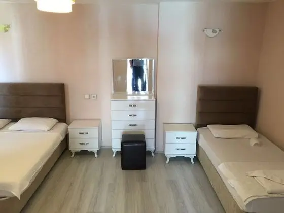 Üç Kişilik Oda