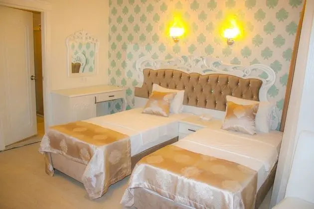 Deluxe Üç Kişilik Oda