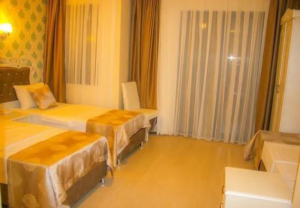 Deluxe Üç Kişilik Oda