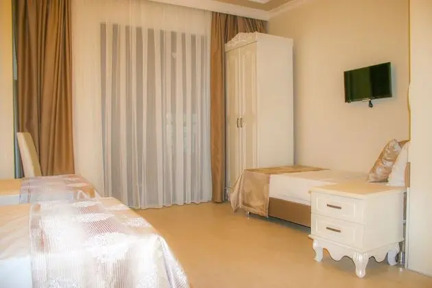 Deluxe Üç Kişilik Oda
