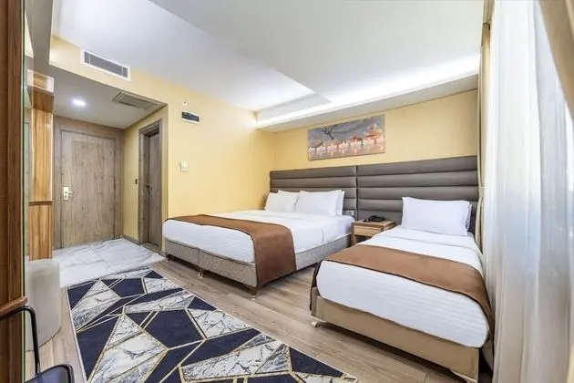 Deluxe Üç Kişilik Oda