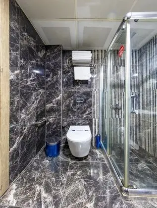 Deluxe Üç Kişilik Oda