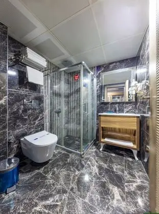 Deluxe Üç Kişilik Oda