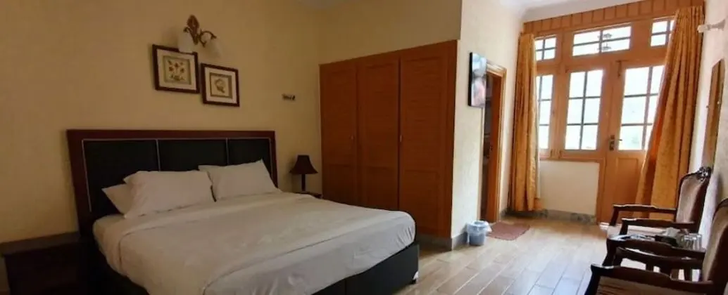 Deluxe Tek Büyük veya İki Ayrı Yataklı Oda