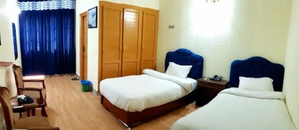 Deluxe Tek Büyük veya İki Ayrı Yataklı Oda
