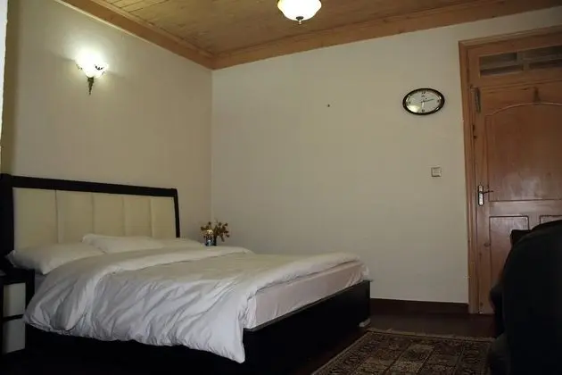 Deluxe Tek Büyük veya İki Ayrı Yataklı Oda