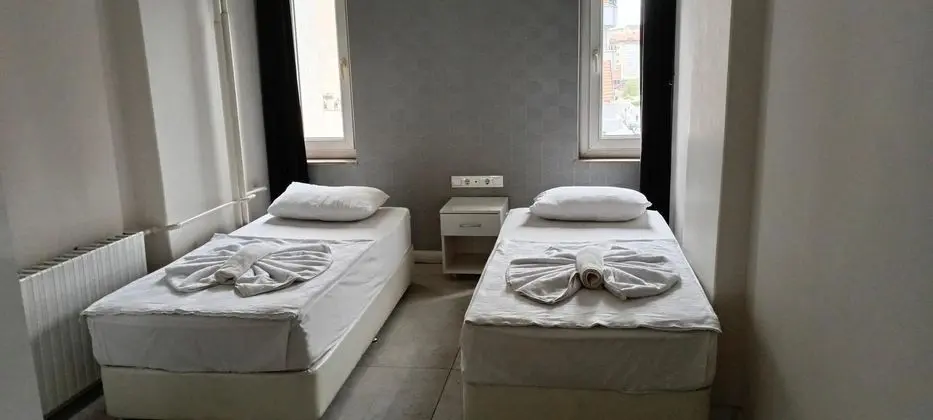 Twin,İKi Tek Kişilik Yataklı
