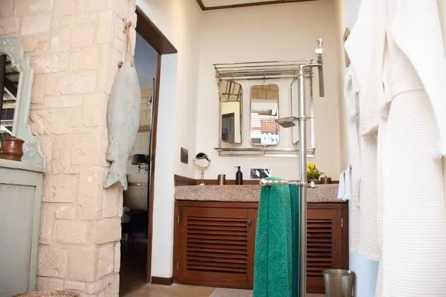 Tek Büyük Yataklı Oda (Huile genereuse de Marula)