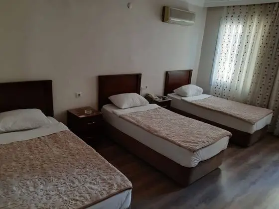 Economy Üç Kişilik Oda