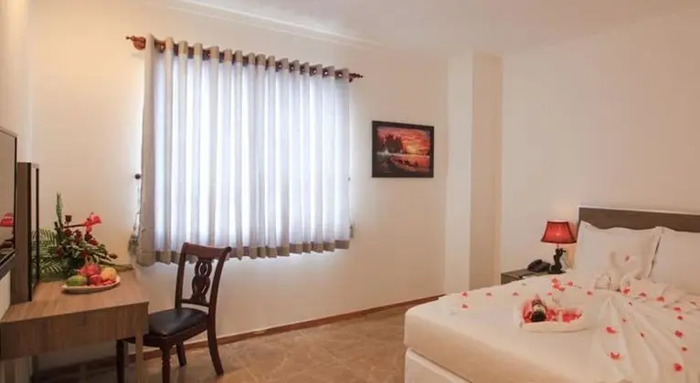 Deluxe Tek Büyük veya İki Ayrı Yataklı Oda