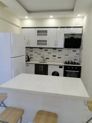 Daire-İki Yatak Odalı,Deniz ve Dağ Manzaralı,Balkonlu