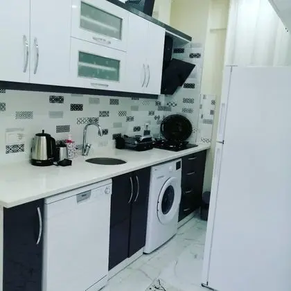 Daire-Tek Yatak Odalı,Deniz ve Dağ Manzaralı,Balkonlu