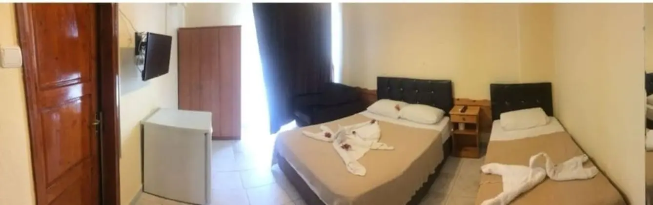 Üç Kişilik Oda