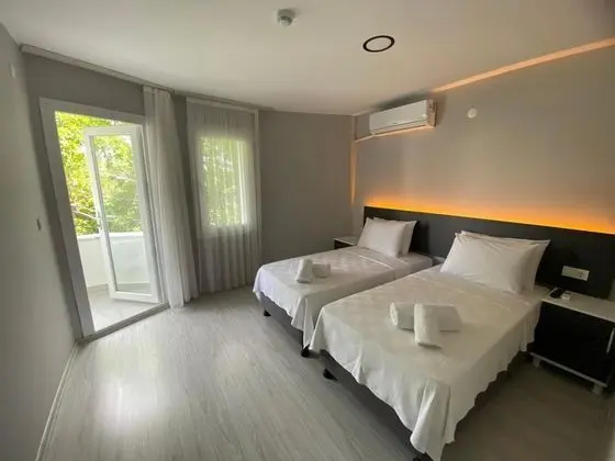 Daire-İki Yatak Odalı, Bahçe Manzaralı, Balkonlu