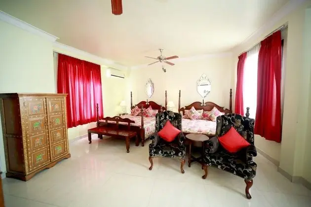 Super Deluxe Room with Full day use of Car with Chauffer and Complimentary Airport Pick Up