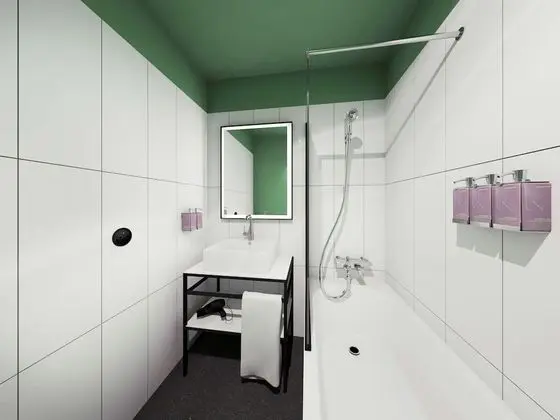 TRIBE Essential courtyard side 2 single beds