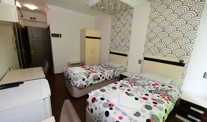 2 Tek Yataklı Oda