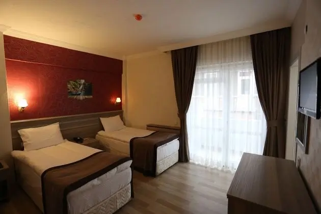 Deluxe Tek Büyük veya İki Ayrı Yataklı Oda