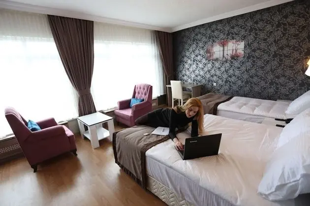 Deluxe Tek Büyük veya İki Ayrı Yataklı Oda