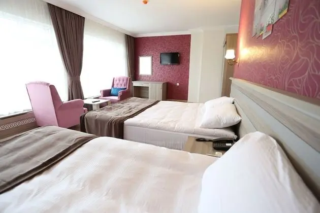 Deluxe Üç Kişilik Oda
