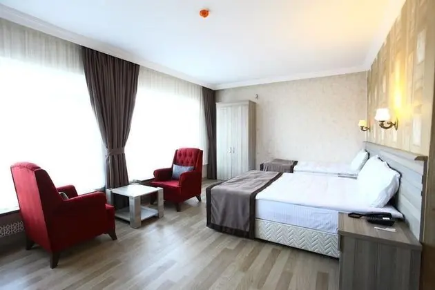 Deluxe Üç Kişilik Oda