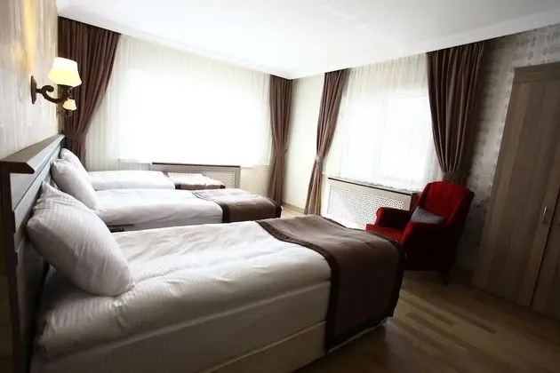 Deluxe Üç Kişilik Oda