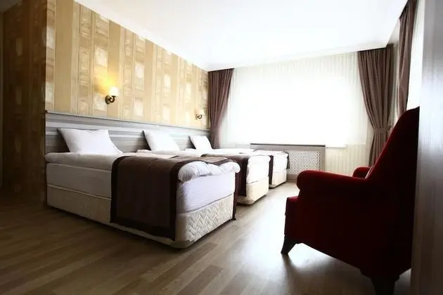 Deluxe Üç Kişilik Oda