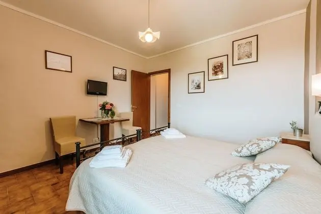 Deluxe Tek Büyük veya İki Ayrı Yataklı Oda (Camera 10)