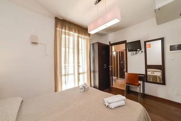Comfort Tek Büyük veya İki Ayrı Yataklı Oda