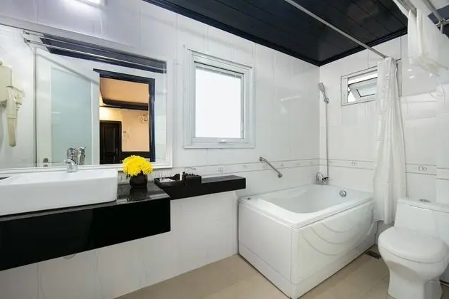 Deluxe Tek Büyük veya İki Ayrı Yataklı Oda (with Window)