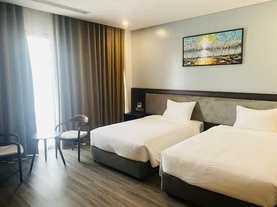 Deluxe Tek Büyük veya İki Ayrı Yataklı Oda