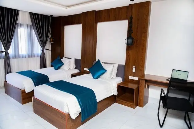 Deluxe Tek Büyük veya İki Ayrı Yataklı Oda