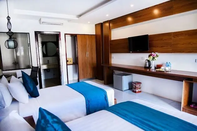Deluxe Tek Büyük veya İki Ayrı Yataklı Oda
