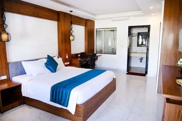 Deluxe Tek Büyük veya İki Ayrı Yataklı Oda