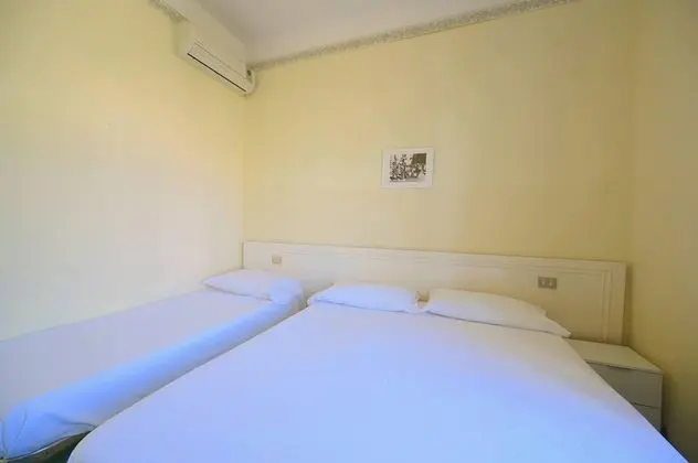 Üç Kişilik Oda
