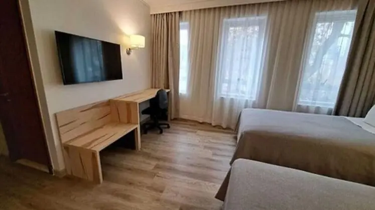 Üç Kişilik Oda