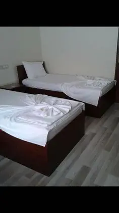 Üç Kişilik Oda