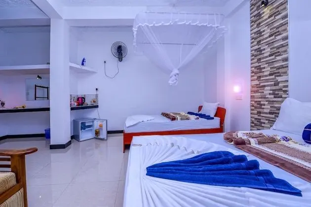 Deluxe Üç Kişilik Oda