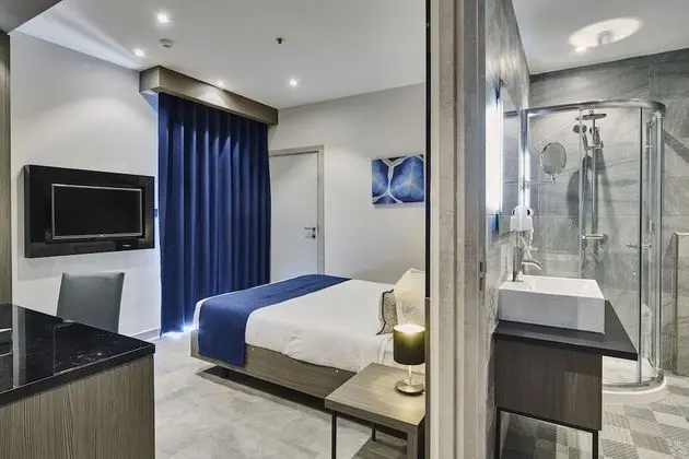 Deluxe Tek Büyük veya İki Ayrı Yataklı Oda, Balkon